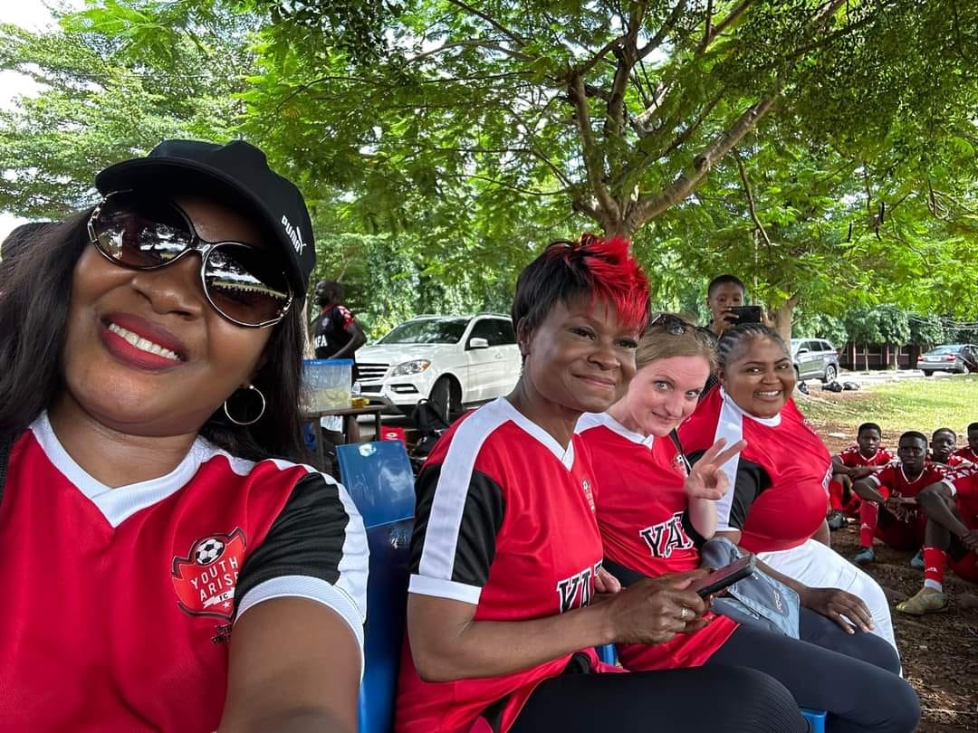 YAFA Mums watching training from the shade at a development camp